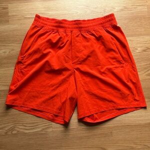 Lululemon Orange 7” Linerless Pace Breaker Shorts